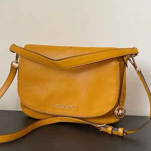 Michael Kors Crossbody Saddle Bag in Mustard Gold Pebble Grain Leather